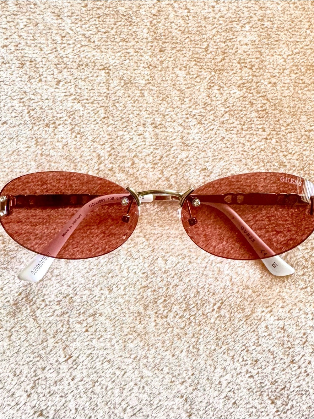 Y2K-Style Guess Rimless Pink Oval Sunglasses